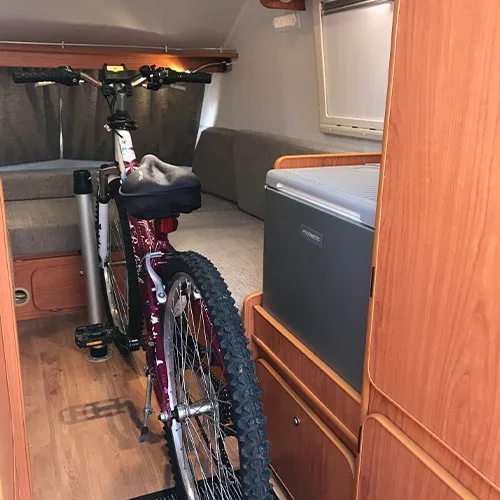 Bike secured inside a Go-Pod near the table leg