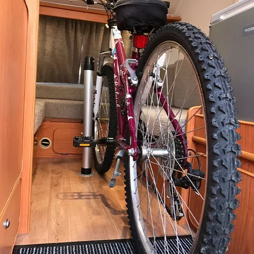 Bike positioned inside a Go-Pod caravan for travel