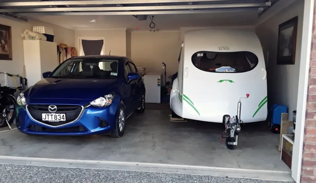 Go-Pod stored beside a car in a double garage