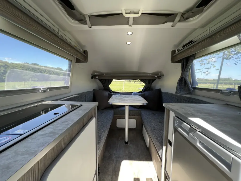 Go-Pod lounge and kitchen with the roof raised